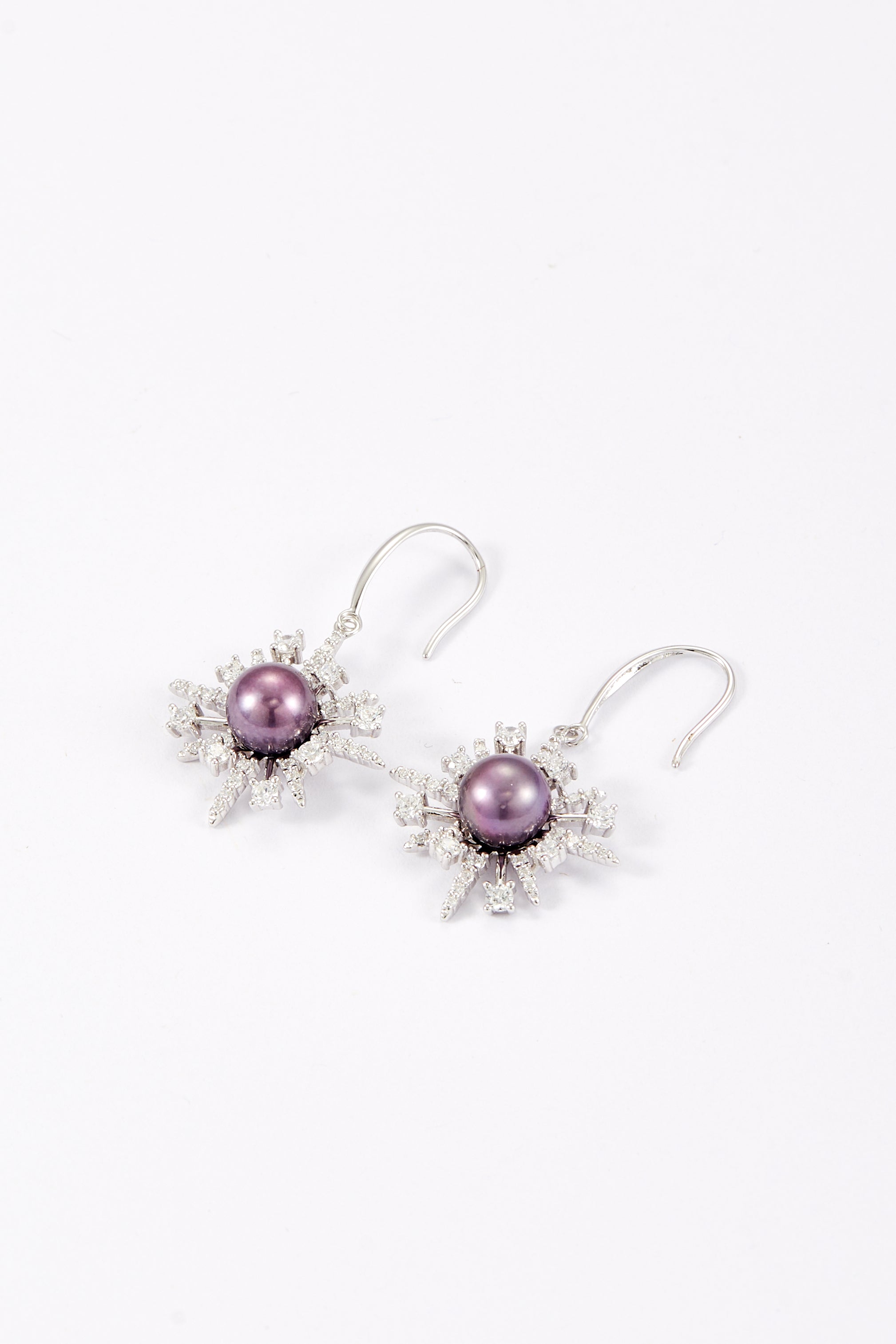 Stellar Frost purple fashion pearl drop earrings with CZ starburst design by Whitney Jewellery