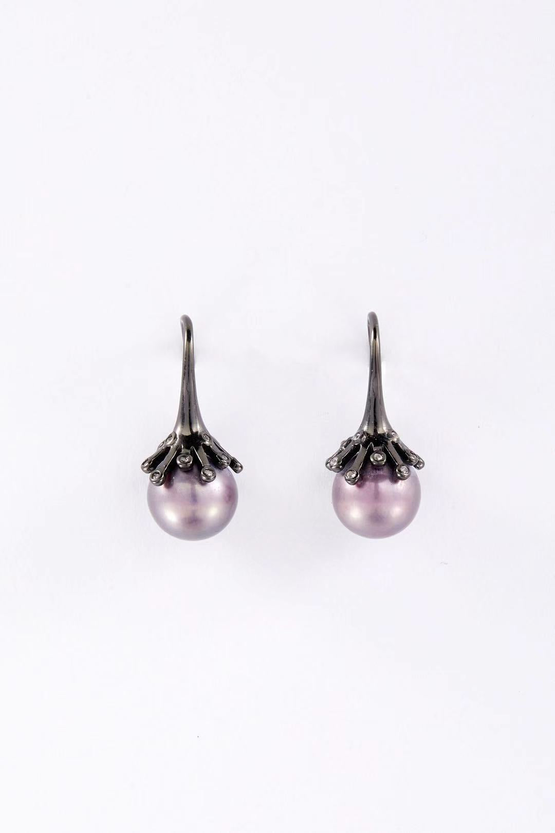 Midnight Bloom purple fashion pearl drop earrings with black alloy base by Whitney Jewellery