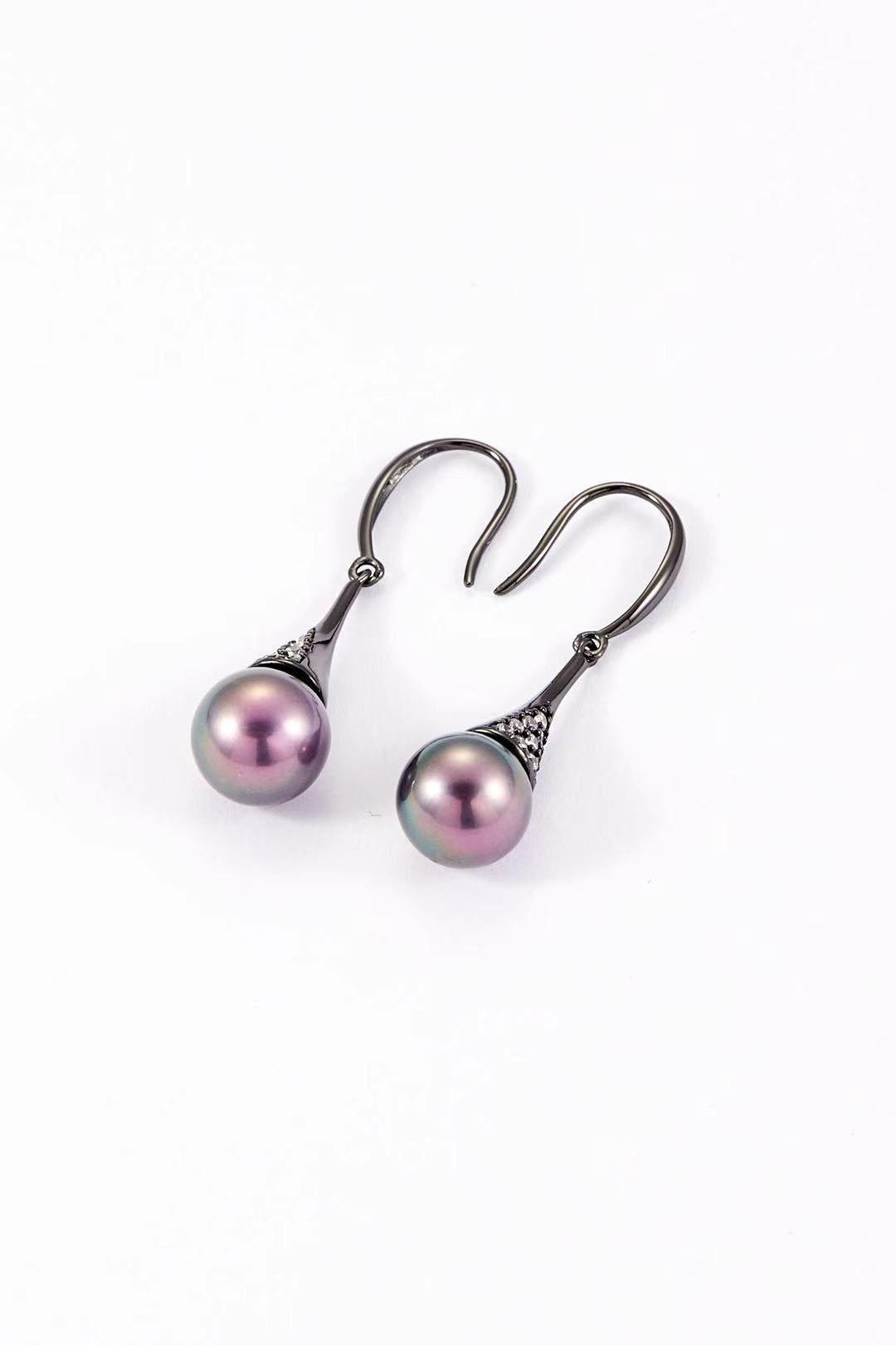 Purple pearl with CZ accents and dark gunmetal alloy hook close-up