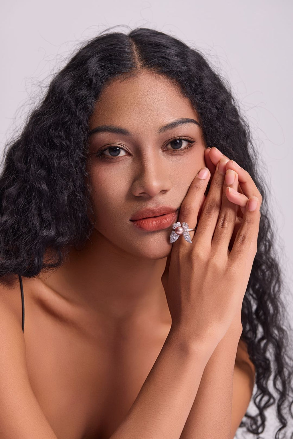 Model wearing Whitney Butterfly pearl ring 