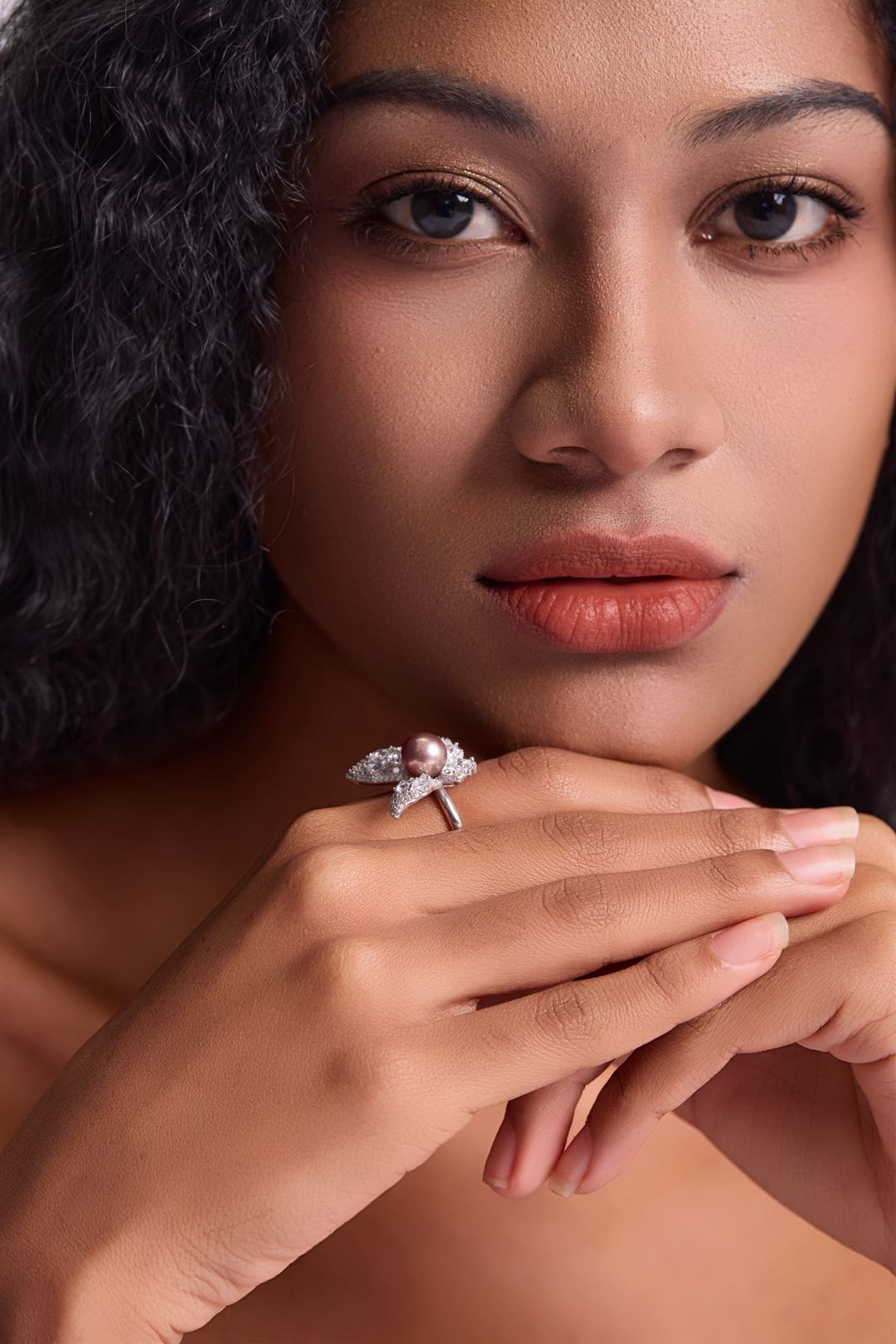 Model wearing Whitney Butterfly pearl ring 