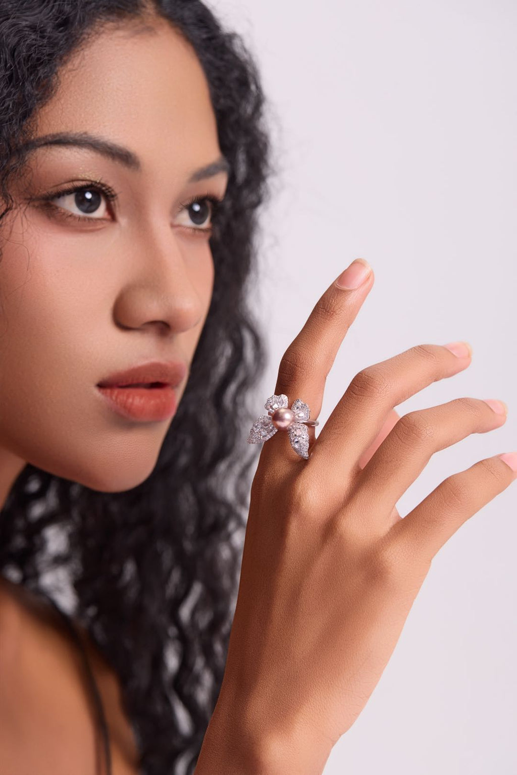 Model wearing Whitney Butterfly pearl ring 