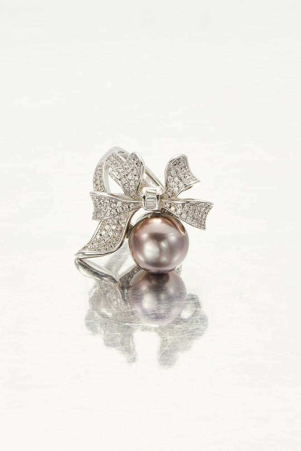 Violet Bow grey-purple fashion pearl adjustable ring with CZ bow design by Whitney Jewellery