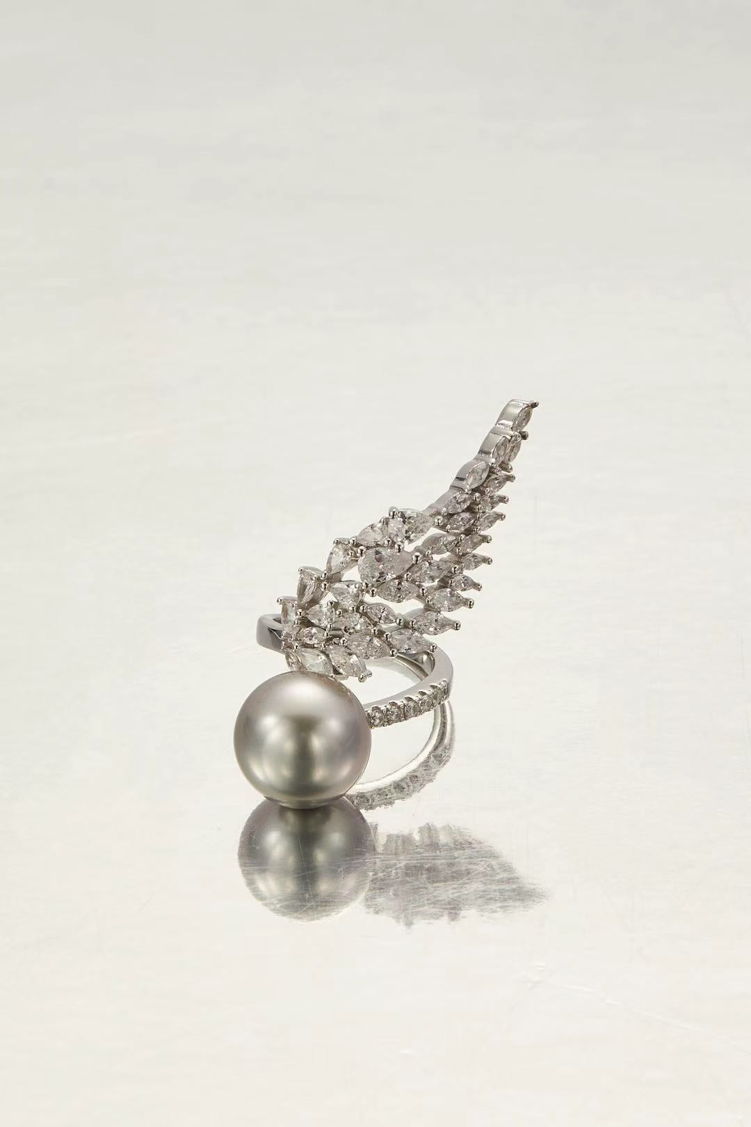 Whitney Winged pearl fashion ring with marquise-cut CZ wing design by Whitney Jewellery