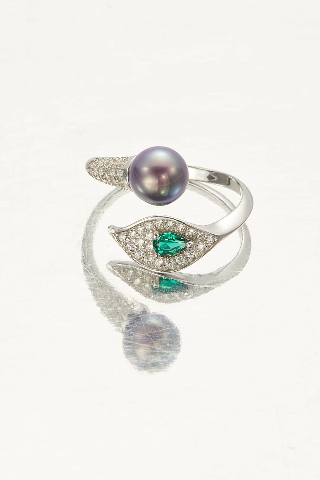 Lumina Pearl and Verdant CZ bypass ring with purple pearl and green teardrop CZ by Whitney Jewellery