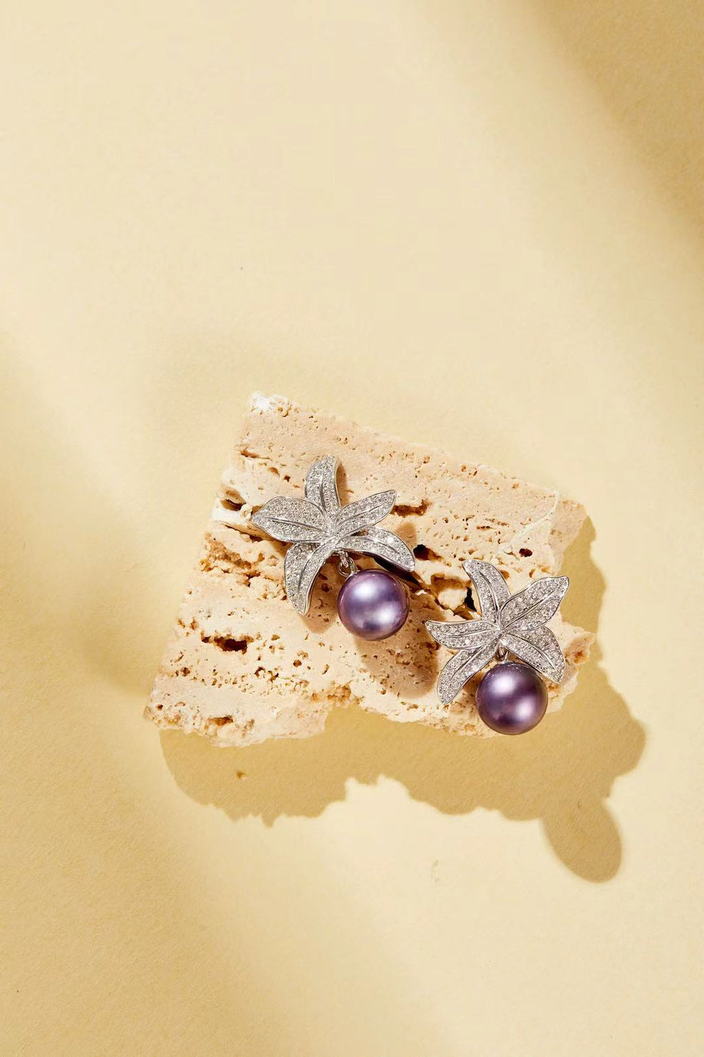 starflower design with purple pearl